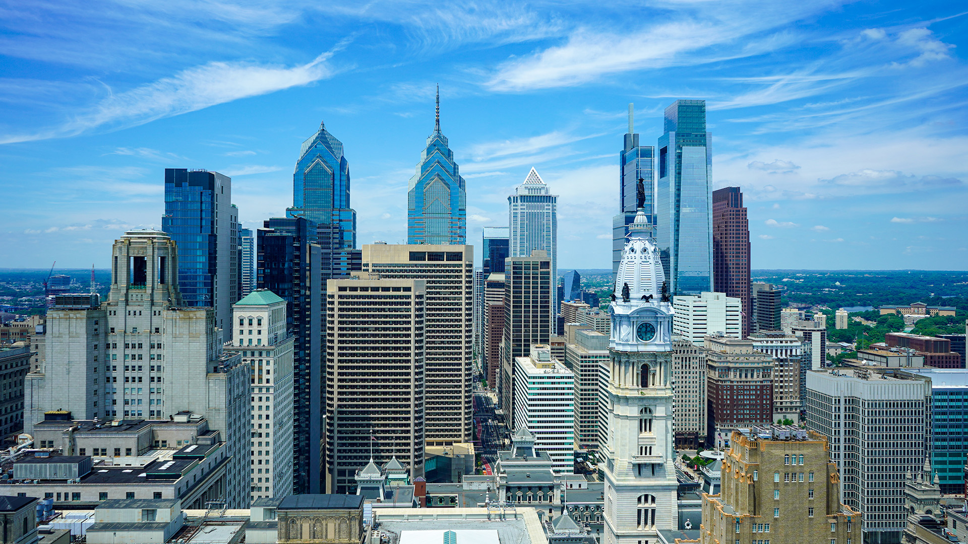 Philadelphia's skyline with bright blue skies.