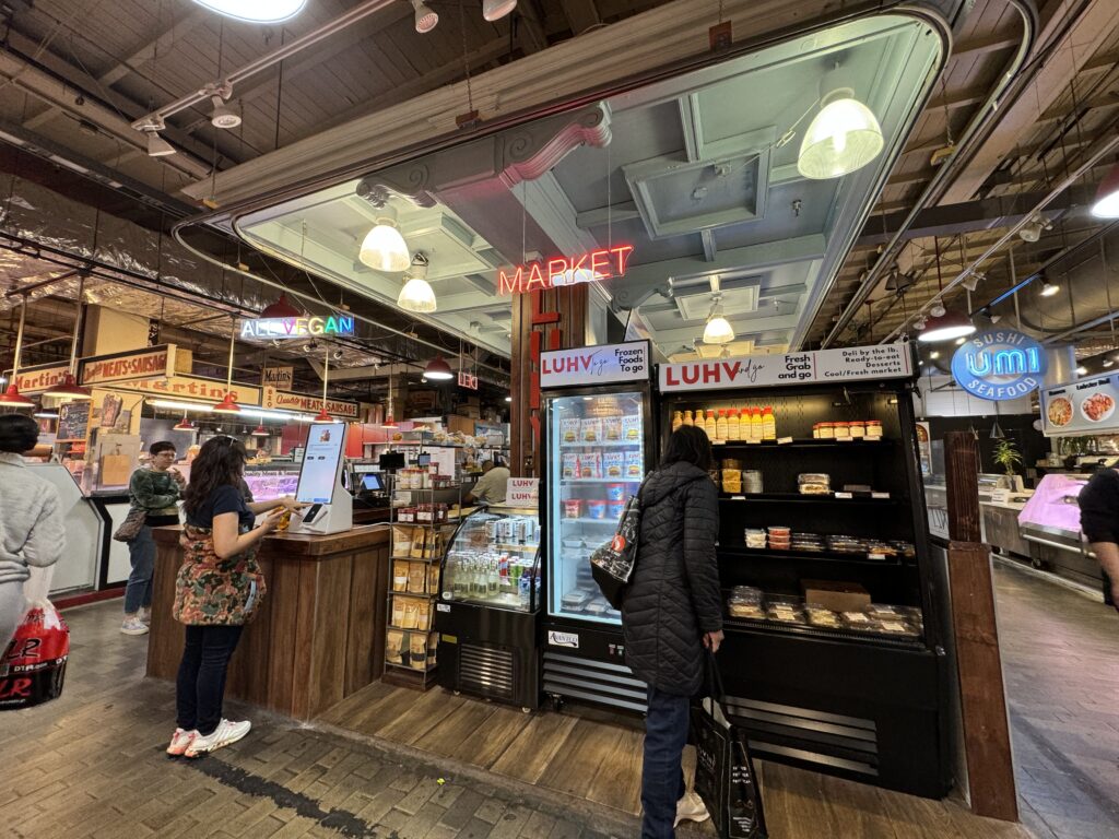 The storefront of LUHV Vegan Deli at Reading Terminal Market.