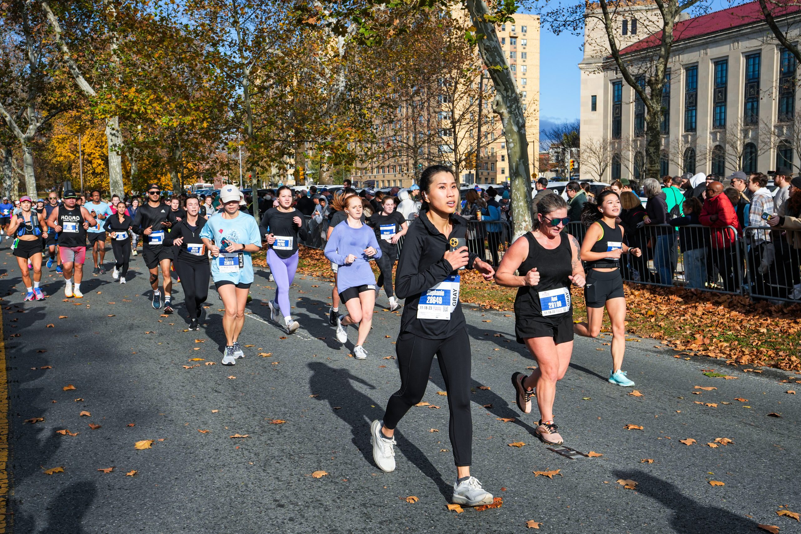 Racers running the Philadelphia Marathon passing Pennsylvania Avenue.