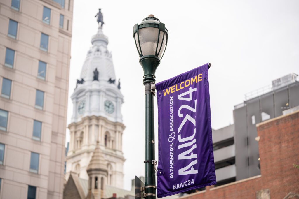 An AAIC banner hangs in front Philadelphia City Hall.